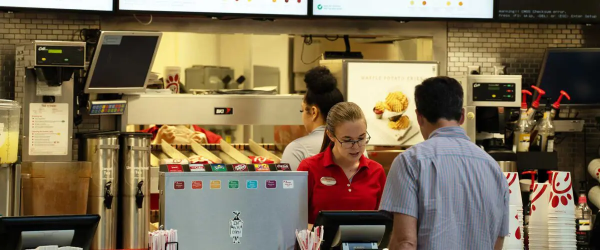 Student ordering from Chick-fil-A counter
