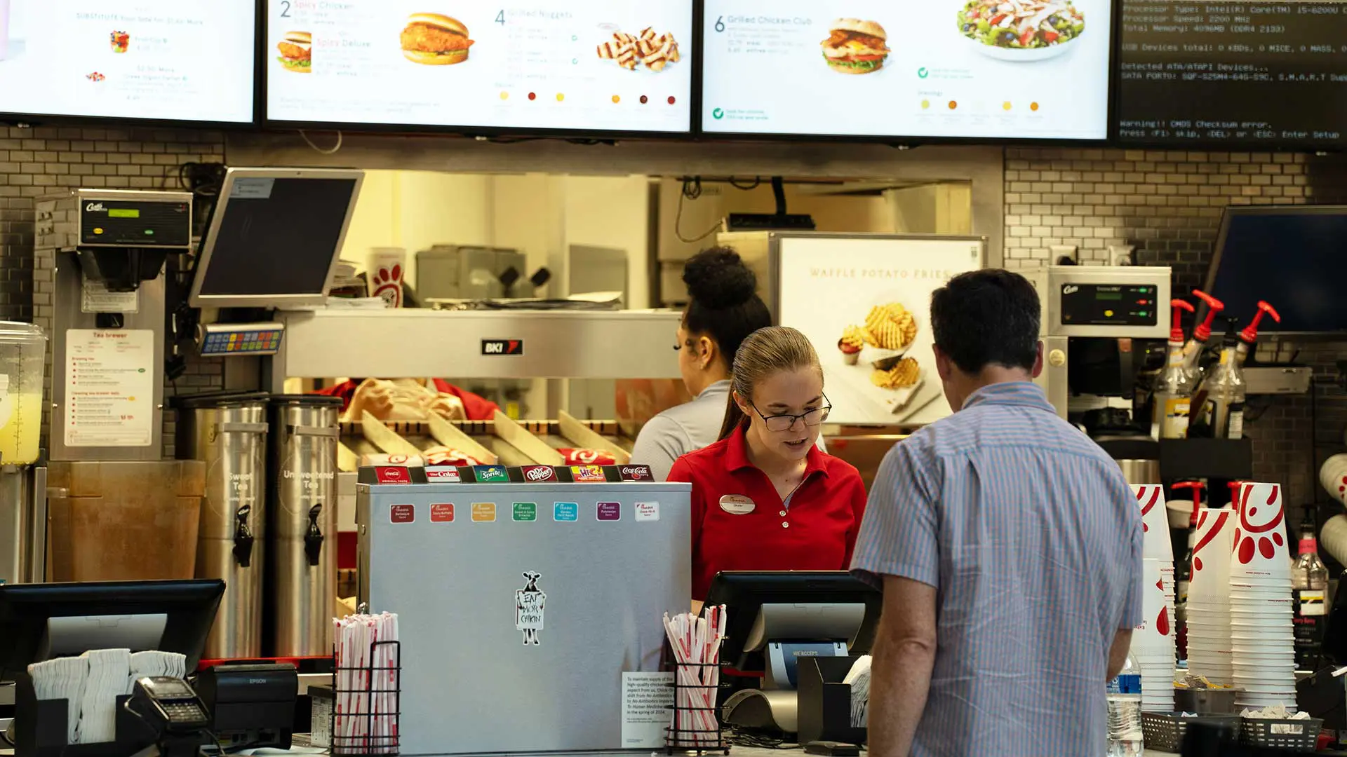 Student ordering from Chick-fil-A counter