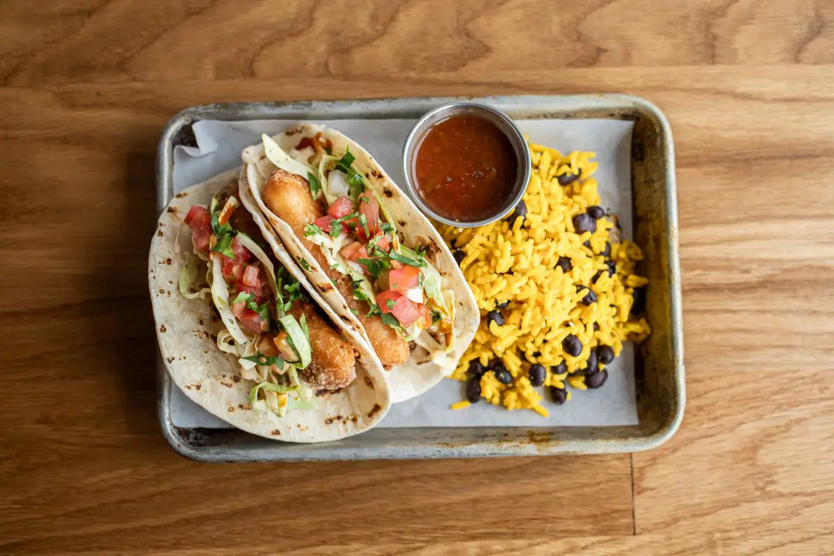 overhead image of fish tacos and rice