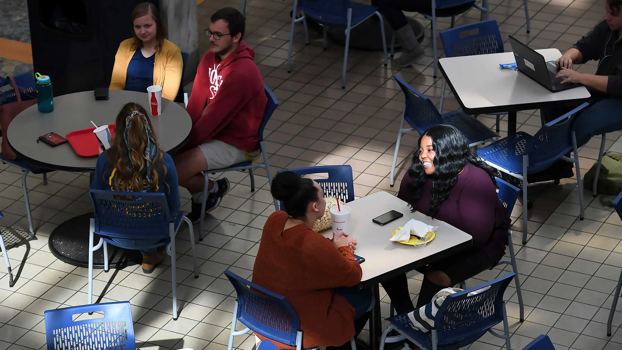 Overhead view of students sitting at tables